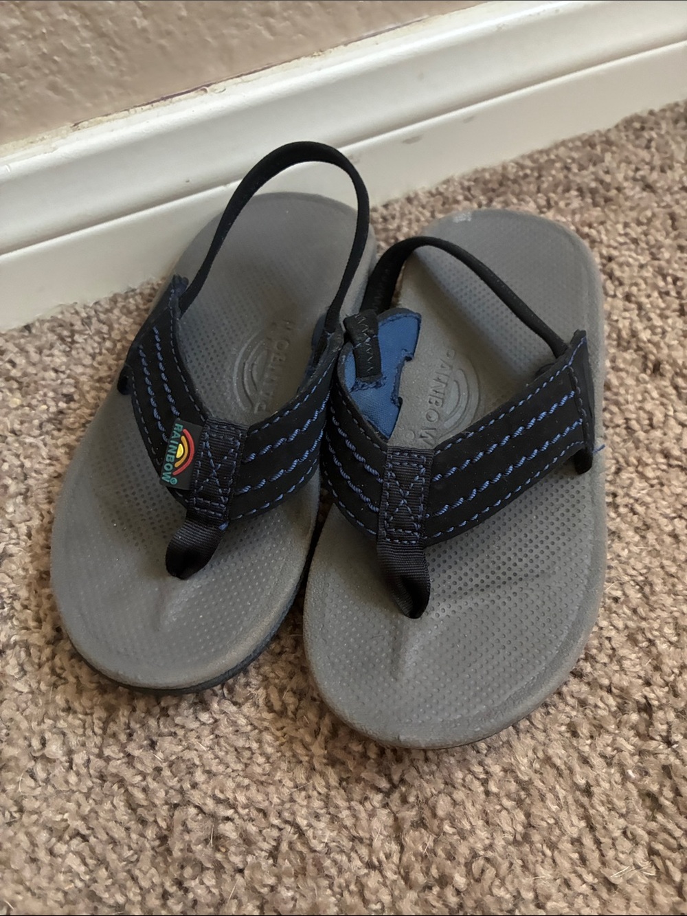Rainbow Kids Gray Flip Sandals with Black Straps and Blue Stitching